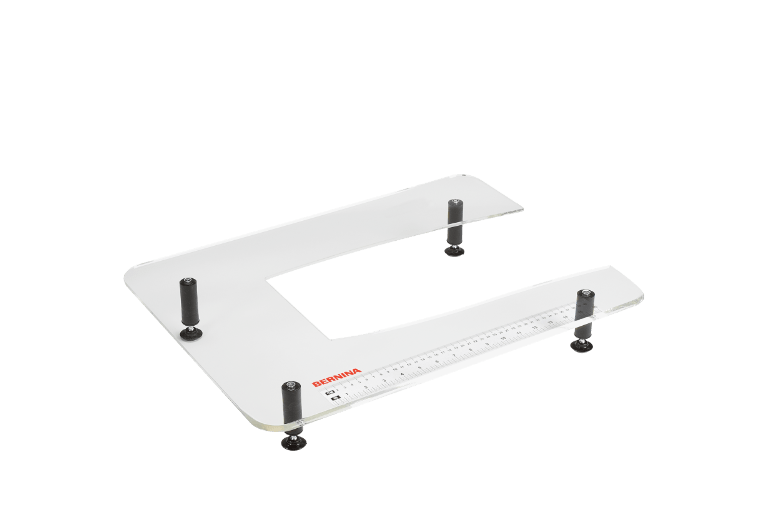 Plexiglass extension table for embroidery module for more work space