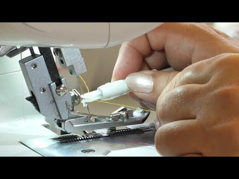 Sewing machine clearance needle threader